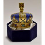 A Royal Crown Derby paperweight titled One Hundred Royal Years, 1890-1990, with its own velvet