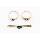 A 9ct rose  gold paste set ring along with a 9ct gold and silver bar brooch set with blue paste