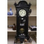 A late 19th Century German, Vienna wall clock with weight ebonised working condition