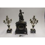 French Black slate figural clock garniture. A.D.Mougin Deux Medailles on the movement with