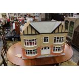 A Fairbanks 1930's style dolls house, from the Dolls House Emporium, Tudor style 1:12 scale,