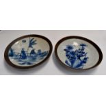 Two Korean style blue and white plaques with bird and people decorations