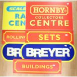 A collection of modern image shop signs including Breyer, Scalextric, Hornby. (7)