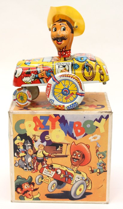 Mettoy Crazy Cowboy tinplate car in original box, rare.