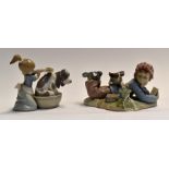 Lladro, a boy and a girl study with dogs, no's 5455 and 5451. 2 items Condition: Boy group has