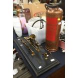 Goodbrand & Co brass instrument along with a mid 20th Century brass fire extinguisher
