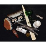 Collection of white metal items including brooch, Chinese counters, white metal foxes, ivory page