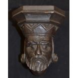 A late 17th / early 18th Century carved oak face of a King
