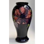 A boxed large Moorcroft anemone baluster vase