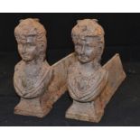 A pair of cast metal and irons with classical 18th Century busts to leading edge.