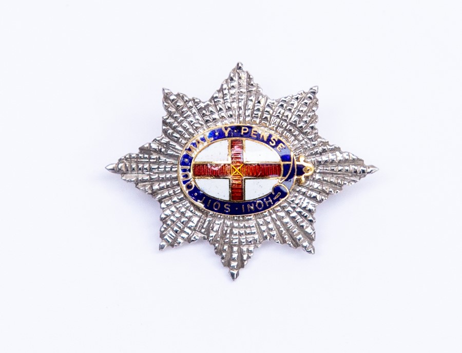 British Order of The Garter miniature in 9ct white Gold and coloured enamels with some chipping to