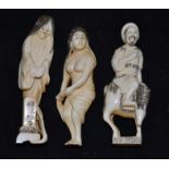 Three ivory figurines, Netsuke, comprising of a horseman, old lady and female figure