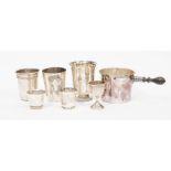 A collection of French silver, including three beakers and tot, various sizes and decoration,