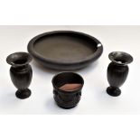 A black Wedgwood dish, pair of black Wedgwood vases and a small bowl all 20th Century