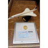 Concorde model 1969-2003 on stand, together with Concorde boarding pass from last flight, London-New