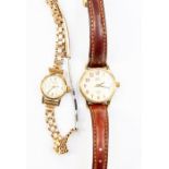 A 9ct gold ladies watch on later rolled gold strap along with a ladies  Timex dress watch with