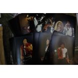 A collection of assorted Michael Jackson colour photographs from concert