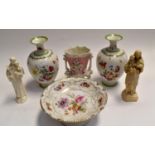 A pair of Continental floral vases, fruit bowl, posy vase and two religious figures