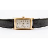 A JW Benson 9ct gold cased wrist watch, black leather strap