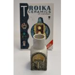 A Troika pottery rough textured vase ( spice jar ) with geometric design to four sides, by Shirley