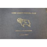 A collection of Derby County memorabilia to include The Ram Newspaper, contained within an