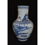 A very finely decorated early 20th century Chinese blue and white baluster shape vase having figural
