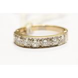 An 18ct white gold seven stone diamond ring, total diamond weight approx 1.05ct, size Q1/2, approx