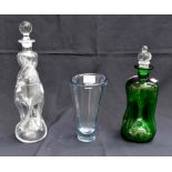 A Holmegaard 1958 pale blue vase, a squashed green decanter together with an ant glass decanter (3)