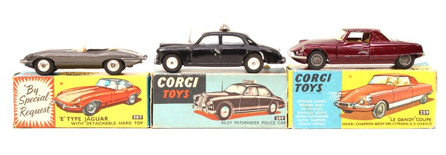 Corgi: A collection of three boxed Corgi vehicles comprising: 307 E Tyoe Jaguar; 209 Riley