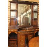 A  19th Century mahogany,  mirror backed display cabinet with decorative inlay .