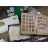 A Lincoln stamp album and box of various stamps/first day covers