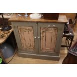 Bespoke Pine kitchen cupboard with American Tin Ceiling tile doors.