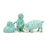 Three Hungarian Herend green figures of animals including rabbits, pig and monkey