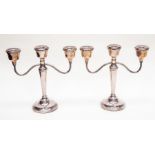 A pair of Birmingham silver candelabras, filled, 1978, maker A.T Cannon Ltd