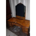 A Queen Anne style bur walnut dressing table with mirror, four short drawers two on each side of the