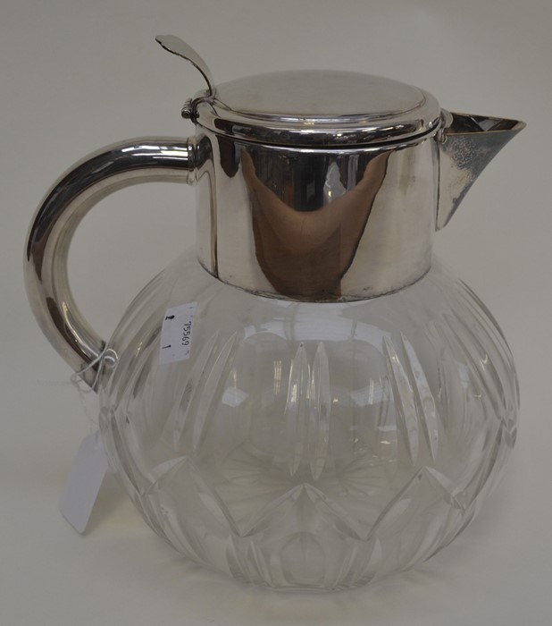 A Mappin & Webb silver plated water jug with interior glass sleeve for ice, cut glass base - Image 2 of 2