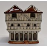 A modern Moorcroft model of a medieval house - thaxted cottage