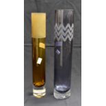 Two cylindrical art glass vases. The acid etched and brown vase signed to bottom, the midnight