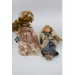 A collection of modern bisque headed dolls in period costume, A pair of wooden bagatelle boards to