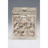 A late 19th Century Indian card case, the body and hinged cover chased with animals with