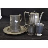 A collection of pewter to include a teapot, tankard, plates and cups (1 box)