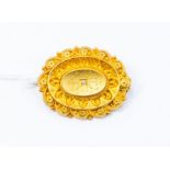 A Victorian yellow metal brooch, set with diamonds, 9.8 grams approx