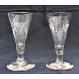 A pair of early 19th Century wine glasses, hand etched detail