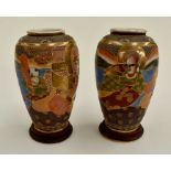 A pair of early 20th Century Japanese Satsuma vases on wood stands, lots of crazing, no damage ie