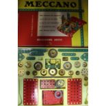 Meccano Mechanisms Outfit plus assorted parts and No.1 clockwork motor, contained in small
