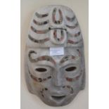 A stone Mexican mask
