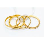 Four 22ct gold rings/bands, total gross weight approx 13.5gms