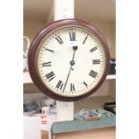 An early 20th Century round school wall clock, 8 day, no pendulum