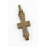 A small bronze Christian cross pendant
