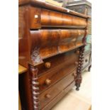 A 19th Century Mahogany Scottish chest of drawers four drawers above three turned fronts.